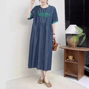 Đầm liền denim ngắn tay cổ tròn thêu hoa trước ngực - NU10142