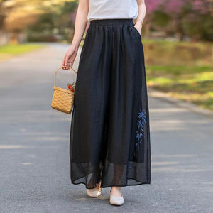 Quần baggy linen lưng thun ống rộng thêu nhành hoa - NU10418