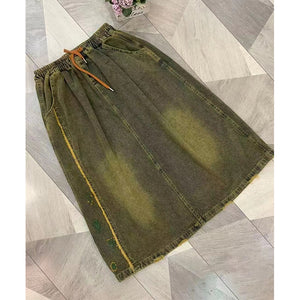 Chân váy denim lưng thun dây rút thêu hoa một bên - NU9192