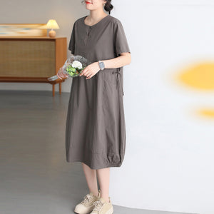 Đầm liền ngắn tay cổ tròn dây rút hai túi tròn - D059