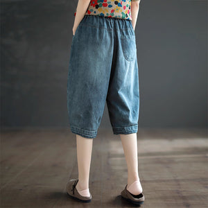 Quần baggy lửng denim lưng thun thêu hoa lá và ô vuông - NU8746