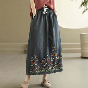 Chân váy denim lưng thun dây rút thêu hoa lá - NU10450