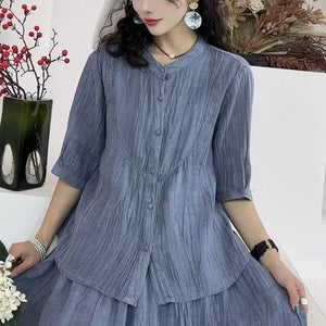 Bộ đồ linen gồm chân váy xẻ vạt và áo sơ mi ngắn tay cổ tròn - NU10405