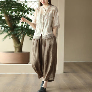 Áo sơ mi organza ngắn tay cổ tròn thêu hoa lá - A010