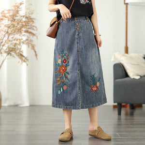 Chân váy denim lưng thun thêu hoa lá vạt xẻ trước - V106