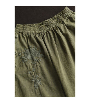 Chân váy linen lưng thun túi chéo thêu hoa văn khuy tròn - NU10250