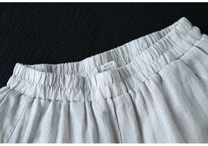 Quần baggy linen lửng lưng thun hai túi sau kiểu lệch - NU10299