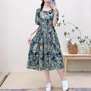 Đầm liền linen ngắn tay cổ tròn in hoa lá chiết eo - NU10184