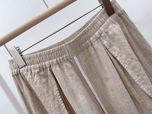 Quần baggy linen lưng thun ống rộng đính khuy - NU9818