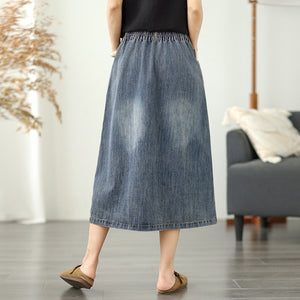 Chân váy denim lưng thun thêu hoa lá vạt xẻ trước - V106