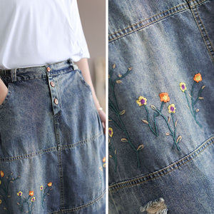 Chân váy denim lưng thun ba khuy cài thêu hoa lá - V007
