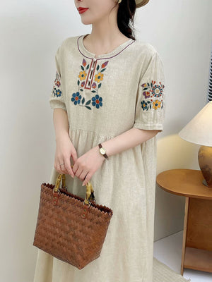 Đầm liền linen ngắn tay cổ tròn thêu hoa đối xứng kiểu chiết eo - NU10503