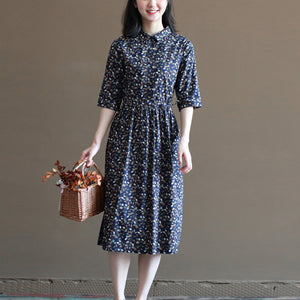 Đầm liền linen ngắn tay cổ đức in những chiếc lá sắc màu - NU10016