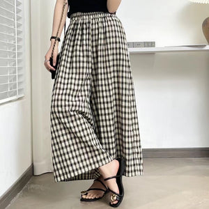 Quần baggy linen lưng thun ống rộng kẻ caro hai túi chéo - NU10159