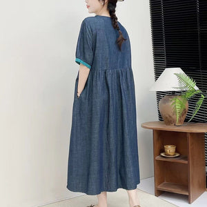 Đầm liền denim ngắn tay cổ tròn thêu hoa trước ngực - NU10142