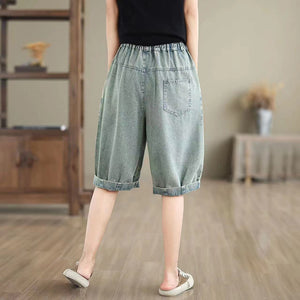 Quần sooc denim lưng thun dây rút thêu ô cửa hoa lá - NU10494