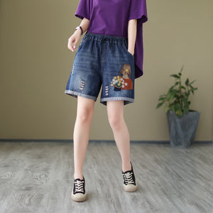 Quần sooc denim lưng thun thêu cô gái bên giỏ hoa - NU9881