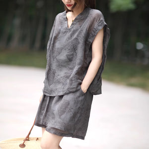 Bộ đồ linen gồm áo sơ mi sát nách cổ V và quần sooc in hoa văn retro hai lớp - NU8972