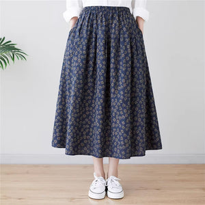 Chân váy linen retro lưng thun túi chéo in hoa cúc liti - NU9156