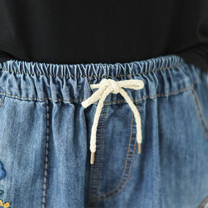 Quần sooc denim lưng thun thêu hoa lá chỉ nổi - NU10287