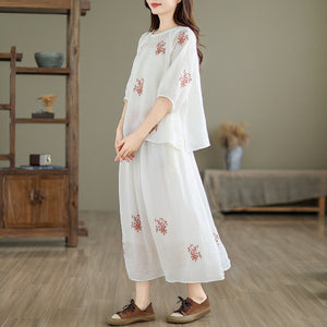 Bộ đồ linen gồm áo sơ mi ngắn tay thêu hoa lá và chân váy chữ A - NU10183