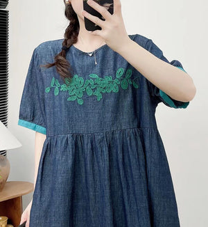 Đầm liền denim ngắn tay cổ tròn thêu hoa trước ngực - NU10142