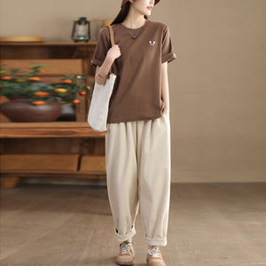Áo T-shirt ngắn tay cổ tròn một màu mặt cười - NU9777