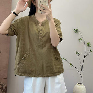 Áo sơ mi linen ngắn tay cổ tròn thêu retro vạt dây rút - NU10346
