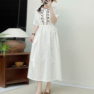 Đầm liền linen ngắn tay cổ tròn thêu hoa văn ô vuông - NU10144
