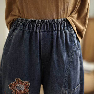 Quần sooc denim lưng thun hai túi chéo đính hoa - Q257