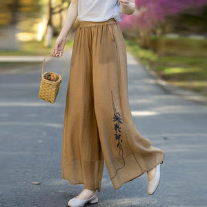 Quần baggy linen lưng thun ống rộng thêu nhành hoa - NU10418