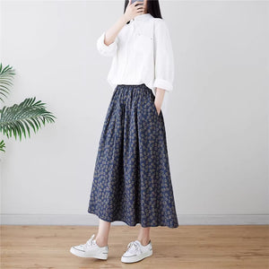 Chân váy linen retro lưng thun túi chéo in hoa cúc liti - NU9156