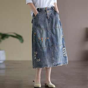 Chân váy denim lưng thun ba khuy cài thêu hoa lá - V007