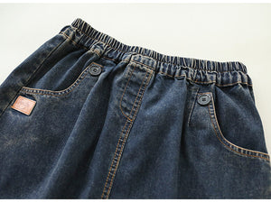 Chân váy denim lưng thun hai túi chéo đính khuy - NU9792
