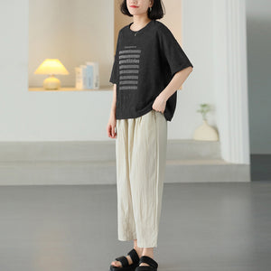 Áo T-shirt ngắn tay cổ tròn in bản nhạc - NU10223