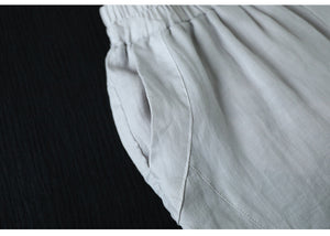 Quần baggy linen lửng lưng thun hai túi sau kiểu lệch - NU10299