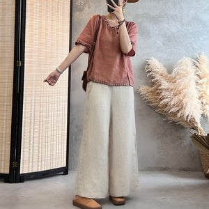 Áo T-shirt linen ngắn tay cổ V thêu bo viền - NU10071