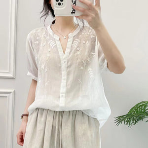 Áo sơ mi linen ngắn tay cổ tròn xẻ V thêu hoa lá đối xứng - NU9999