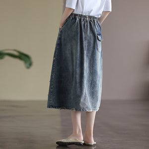 Chân váy denim lưng thun ba khuy cài thêu hoa lá - V007