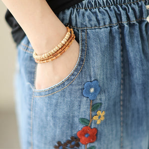 Quần sooc denim lưng thun thêu hoa lá chỉ nổi - NU10287