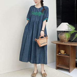 Đầm liền denim ngắn tay cổ tròn thêu hoa trước ngực - NU10142