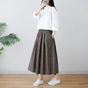 Chân váy linen retro lưng thun túi chéo in hoa liti - V012