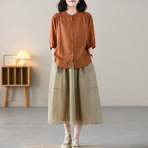 Áo sơ mi linen ngắn tay cổ tròn form rộng vạt mullet - NU8825