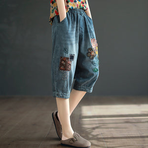 Quần baggy lửng denim lưng thun thêu hoa lá và ô vuông - NU8746