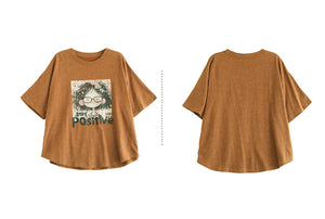 Áo T-shirt ngắn tay cổ tròn in cô gái tóc xù - NU10066