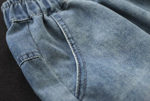 Quần baggy lửng denim lưng thun thêu những vạch màu - NU8902