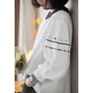 Áo sơ mi dài tay cổ tròn bẻ thêu hoa lá đối xứng - NU9074