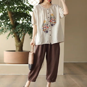 Áo sơ mi linen ngắn tay cổ tròn thêu hoa lá lệch - NU8949