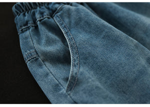 Quần baggy lửng denim lưng thun thêu hoa lá và ô vuông - NU8746