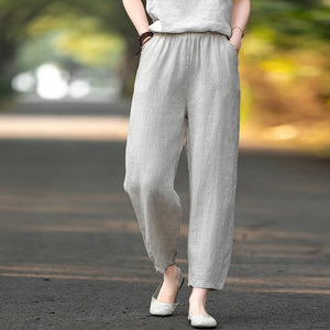 Quần baggy linen lưng thun hai túi chéo tua rua - NU10211